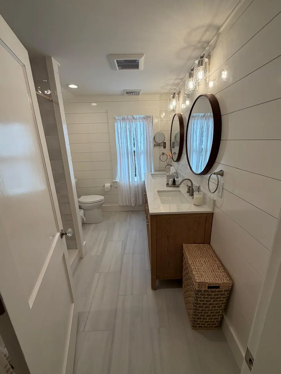 Completed bathroom remodel on Cape Cod by COSTA LVM Home Service