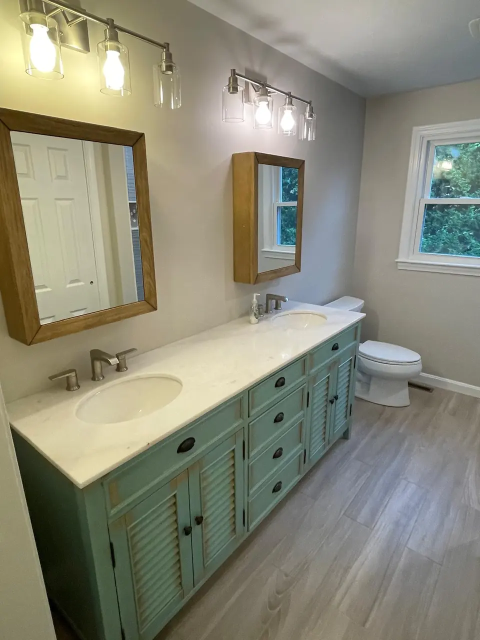 Completed bathroom remodel on Cape Cod by COSTA LVM Home Service