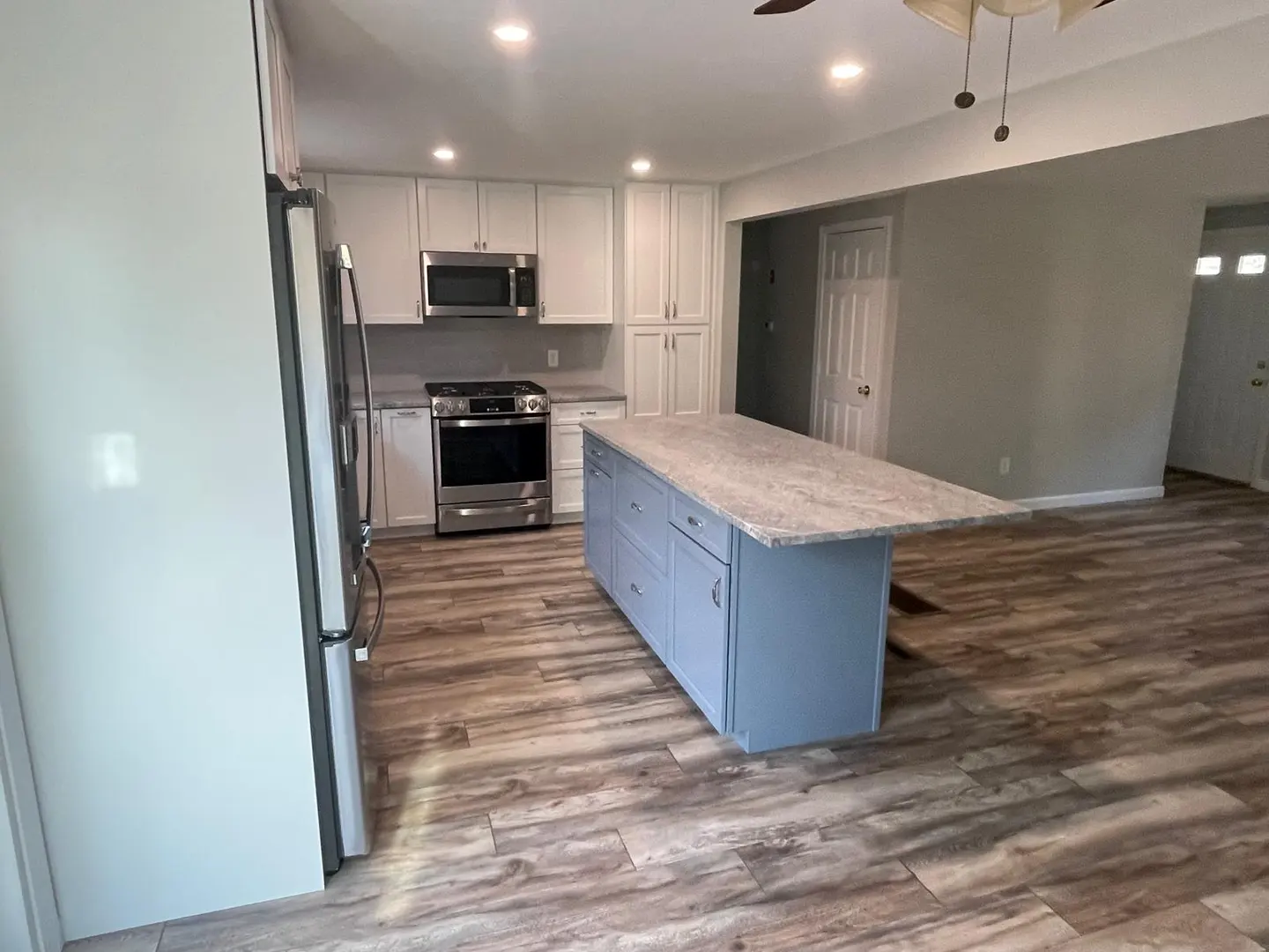 Completed kitchen remodel on Cape Cod by COSTA LVM Home Service